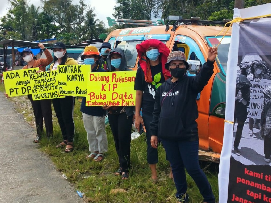 Aksi Bentang Spanduk di Dairi, Kementerian ESDM Sembunyikan Kontrak PT DPM