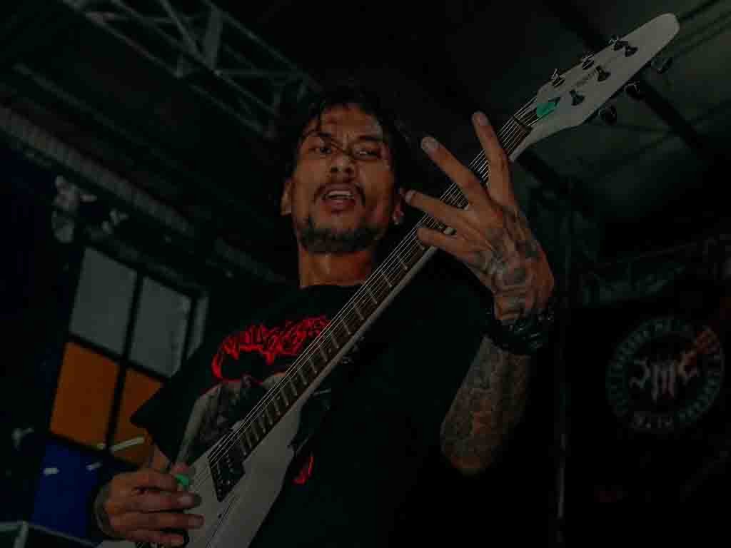 Unit Deathmetal, Siksa Kubur Lepas EP Dari Langit Gitaris Siksa Kubur, Andre Tiranda. (Foto: Istimewa)